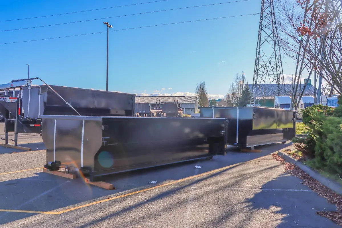 Roll-off dumpster ready for waste disposal at job site for Construction Dumpster Rental in Fort Lewis